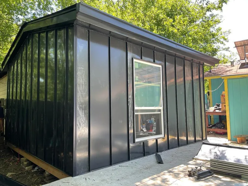 Black standing seam metal wall panels for Metal Roof Installation in East Greenwich