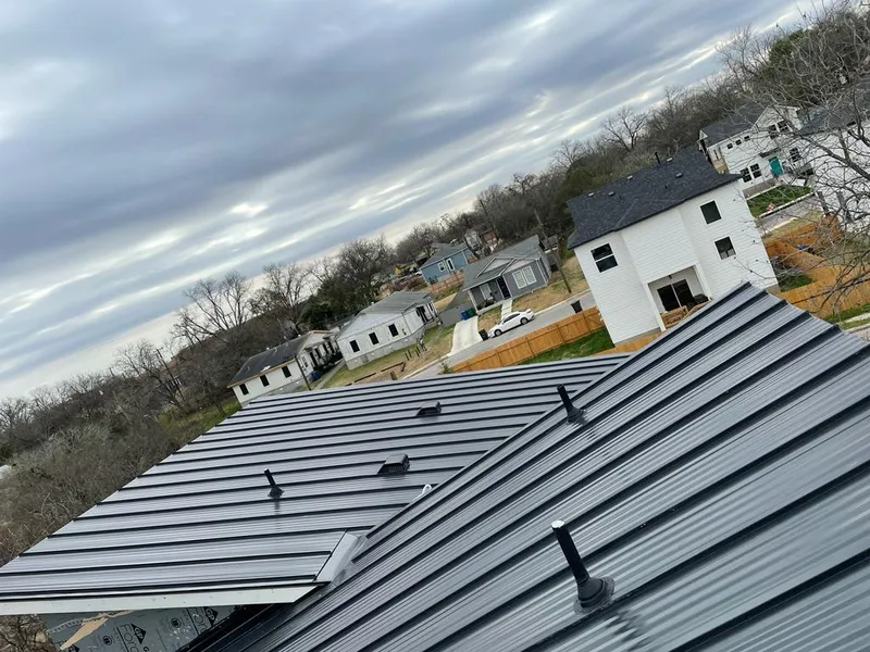 Standing seam metal roof panels with vents for Skylight Repair in East Greenwich